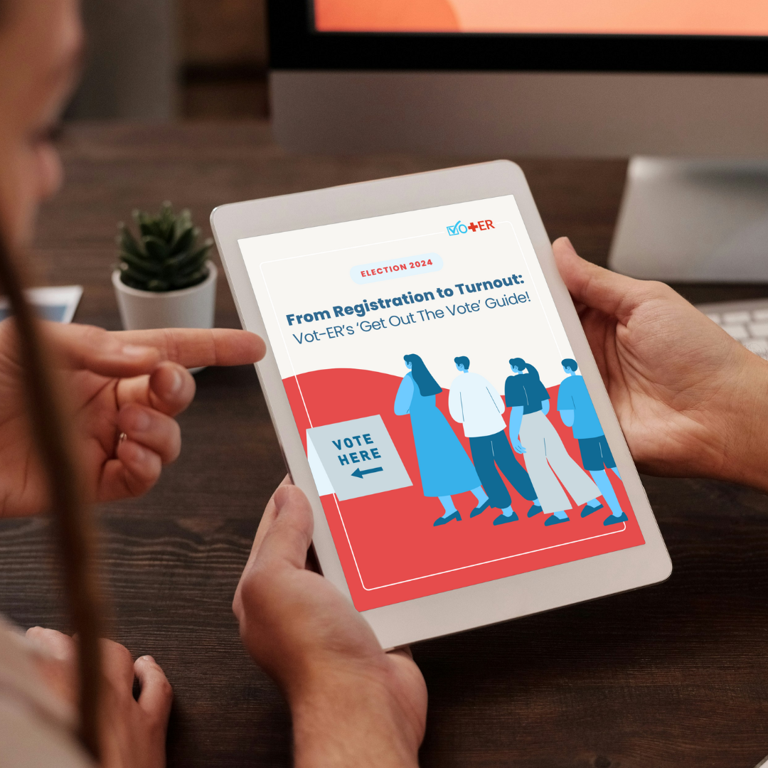 Two people discussing the Vot-ER Get Out the Vote Toolkit displayed on a tablet