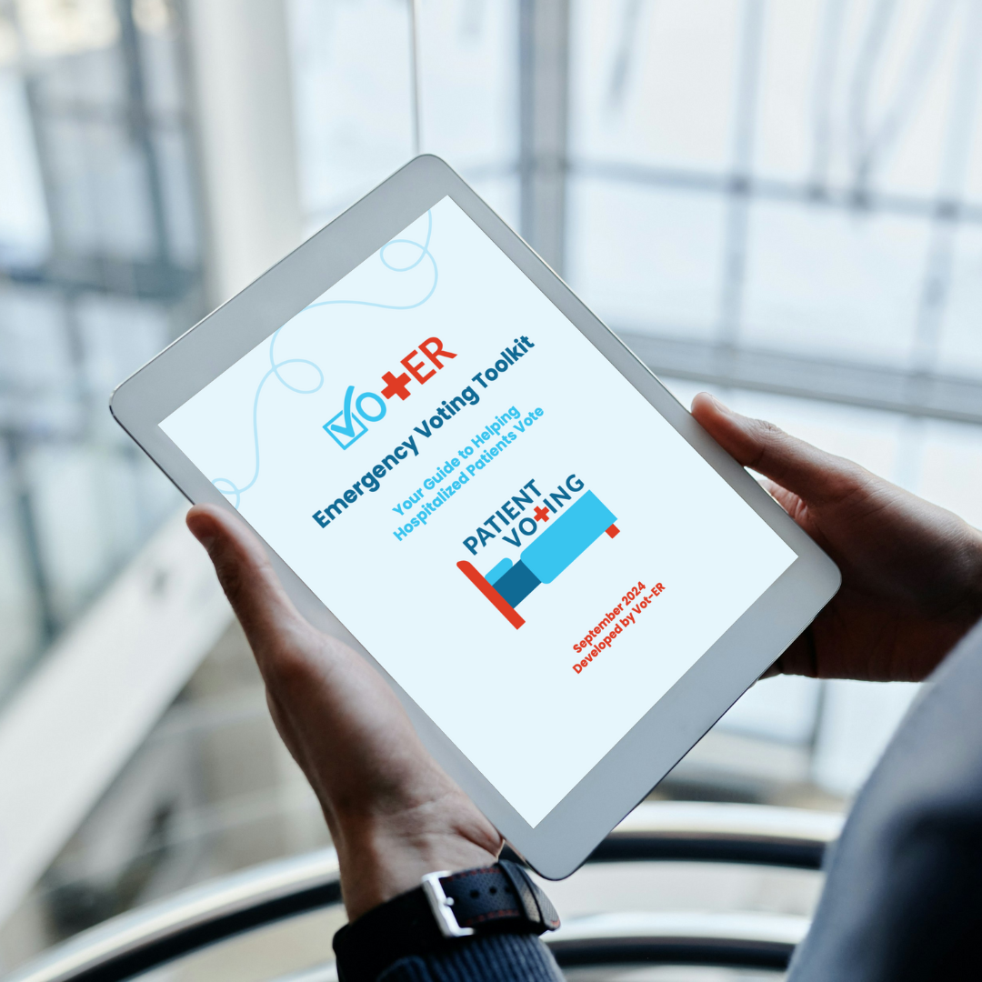 Person holding tablet device with Emergency Voting Toolkit displayed