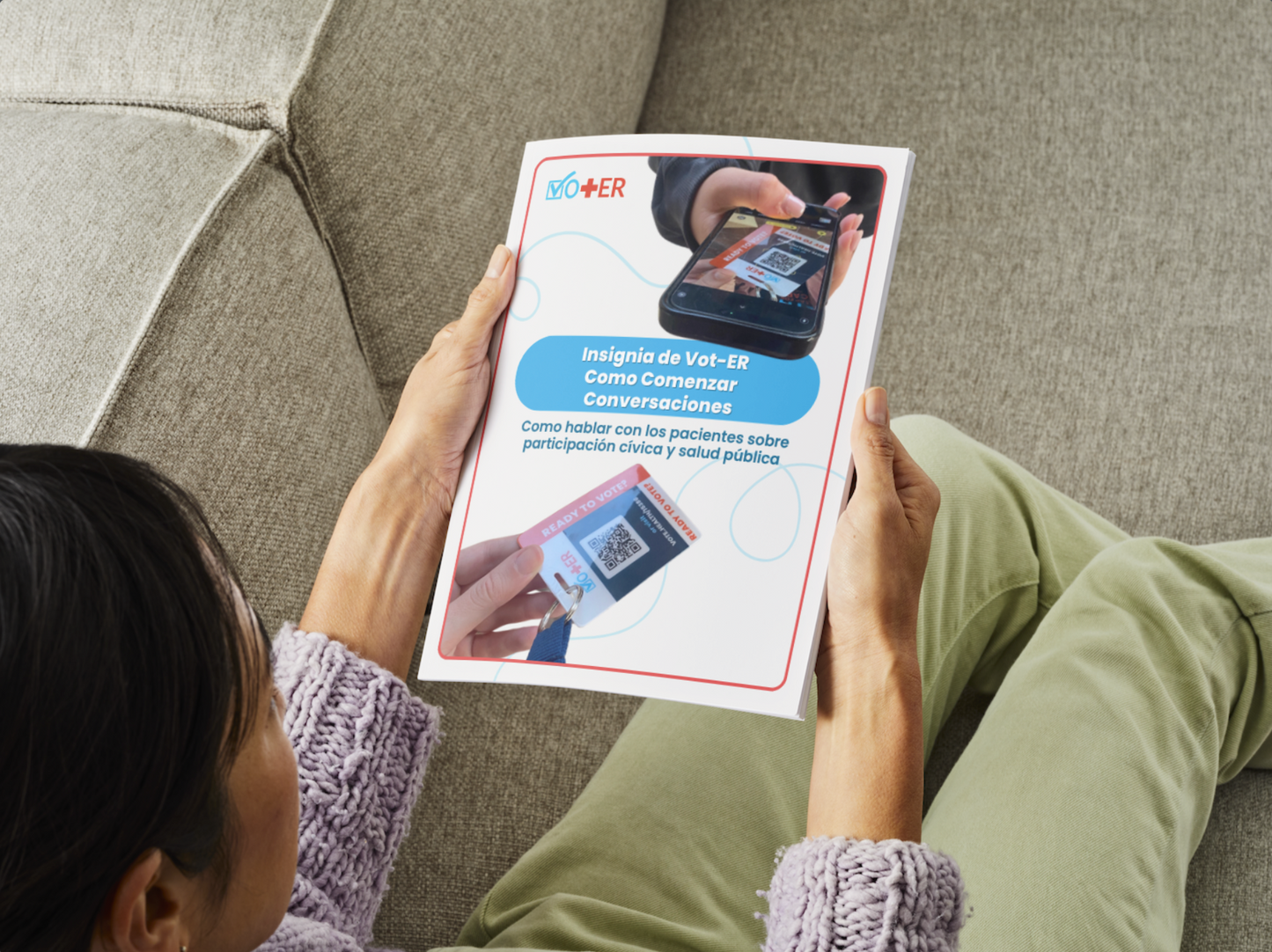 A person sitting on couch holding the Spanish Vot-ER Conversations Starter guide