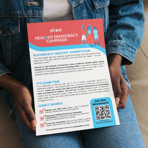 Person holding Vot-ER's Healthy Democracy Campaign one pager