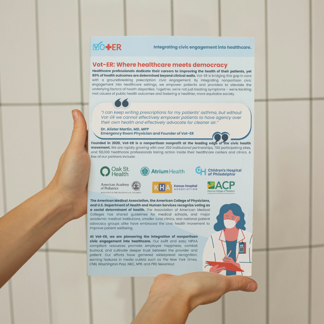 A person holding the About Vot-ER one pager up with a tile wall background